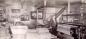 Marie�Louise Allard Blanchard pose fi�rement devant son m�tier m�canis� � vers 1930  