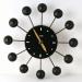 Une des nombreuses versions de l'horloge murale lectrique  billes et tiges , Snider Clock Mfg Co.
