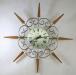 Horloge murale  toile  avec boucles fantaisistes, mouvement  pile, Snider Clock Mfg Co.