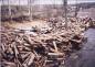 Billots de bois agglutins  la suite de la crue des eaux aux rapides de Bois-Franc