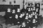 Groupe en classe en 1952 avec un visiteur de marque : Mgr Bruno Desrochers