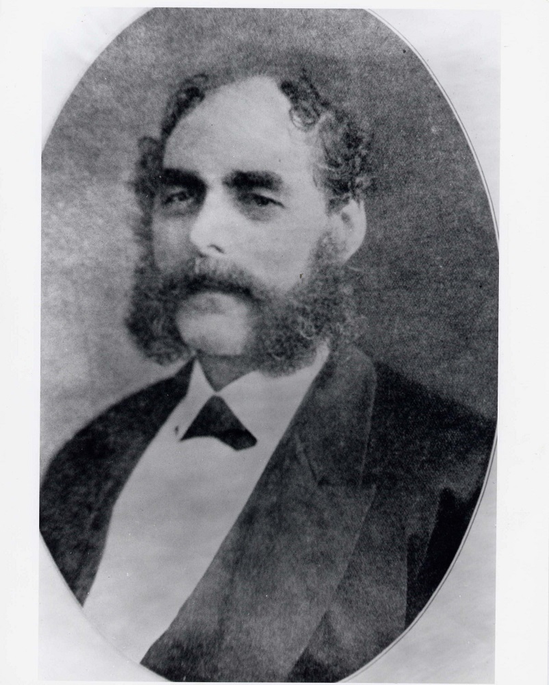 Portrait officiel en noir et blanc de Solomon Hart portant des favoris en côtelette.