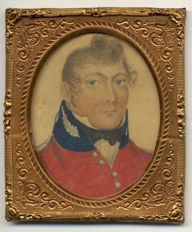Portrait en couleurs dans un cadre doré d’un homme blanc portant une tunique militaire rouge identifié comme étant le lieutenant-colonel Isaac Allen.