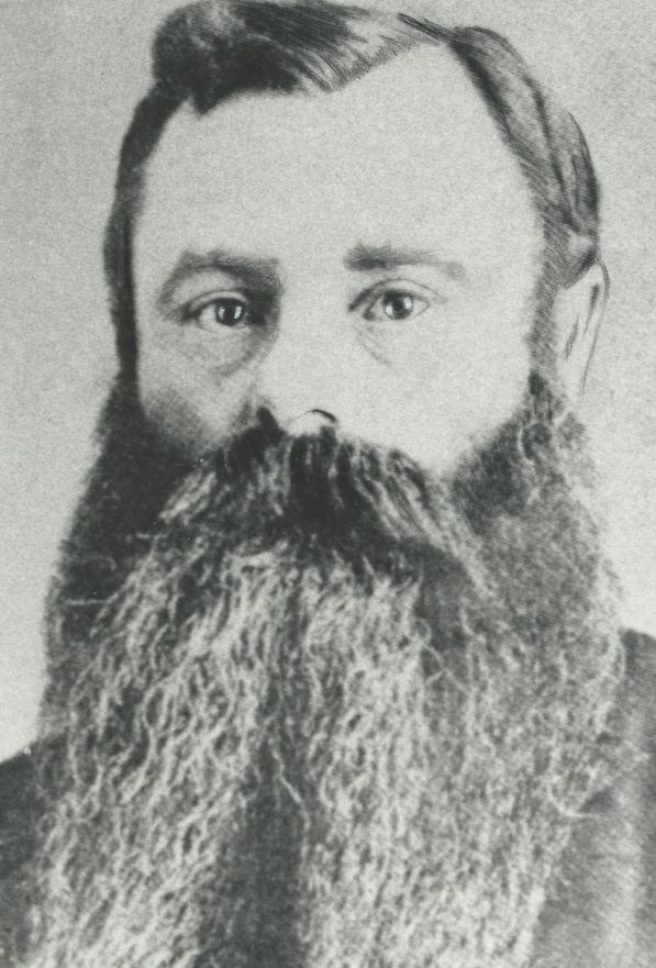Portrait noir et blanc de Lazarus Cohen, un homme arborant une longue barbe, datant de la fin du 19e siècle.
