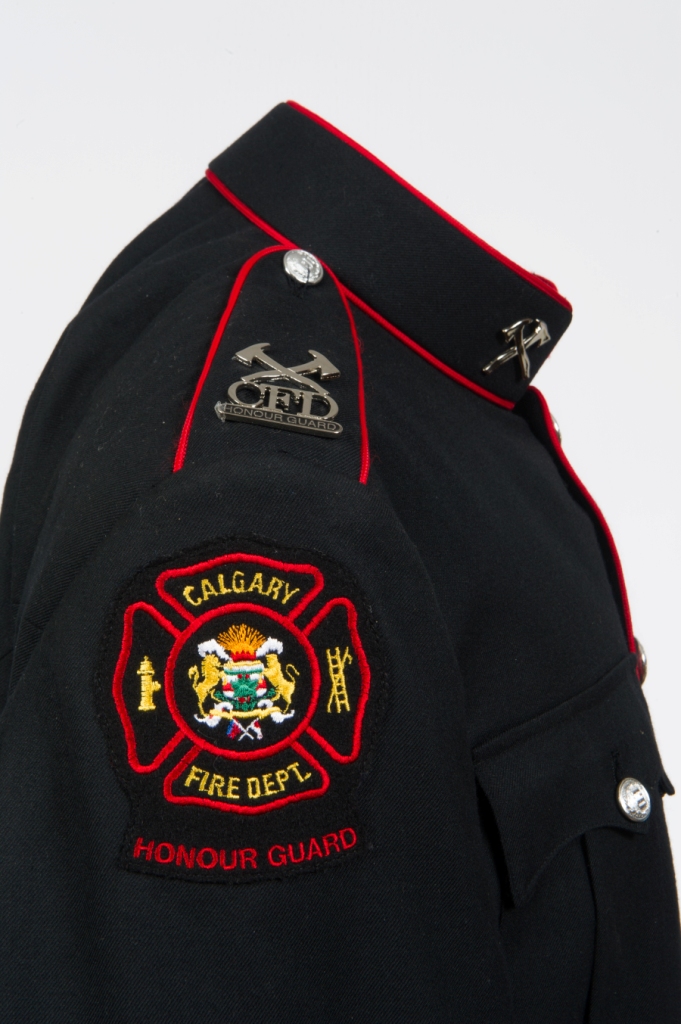 Close up of Honour Guard uniform right shoulder, with patch and badge.
