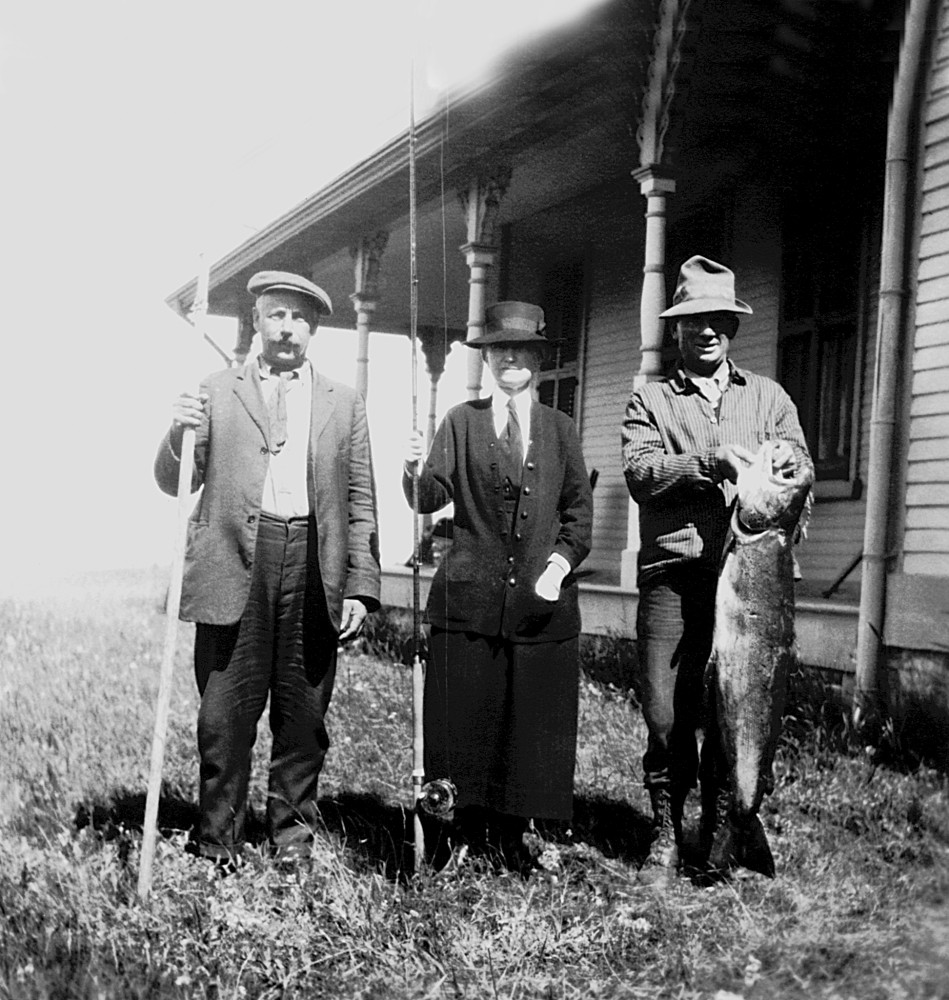 Silver print of Lady Mount Stephen with two guides showing one spectacular salmon.