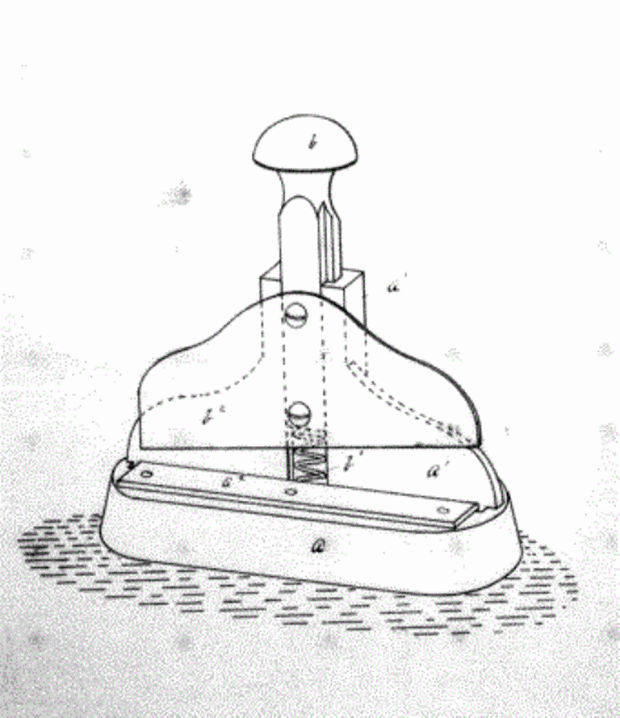 Image noir et blanc du dessin d’un instrument composé d’une base, d’une élévation ainsi que d’une lame.