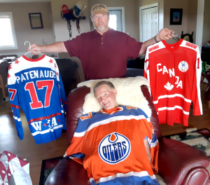 Two men with hockey jerseys