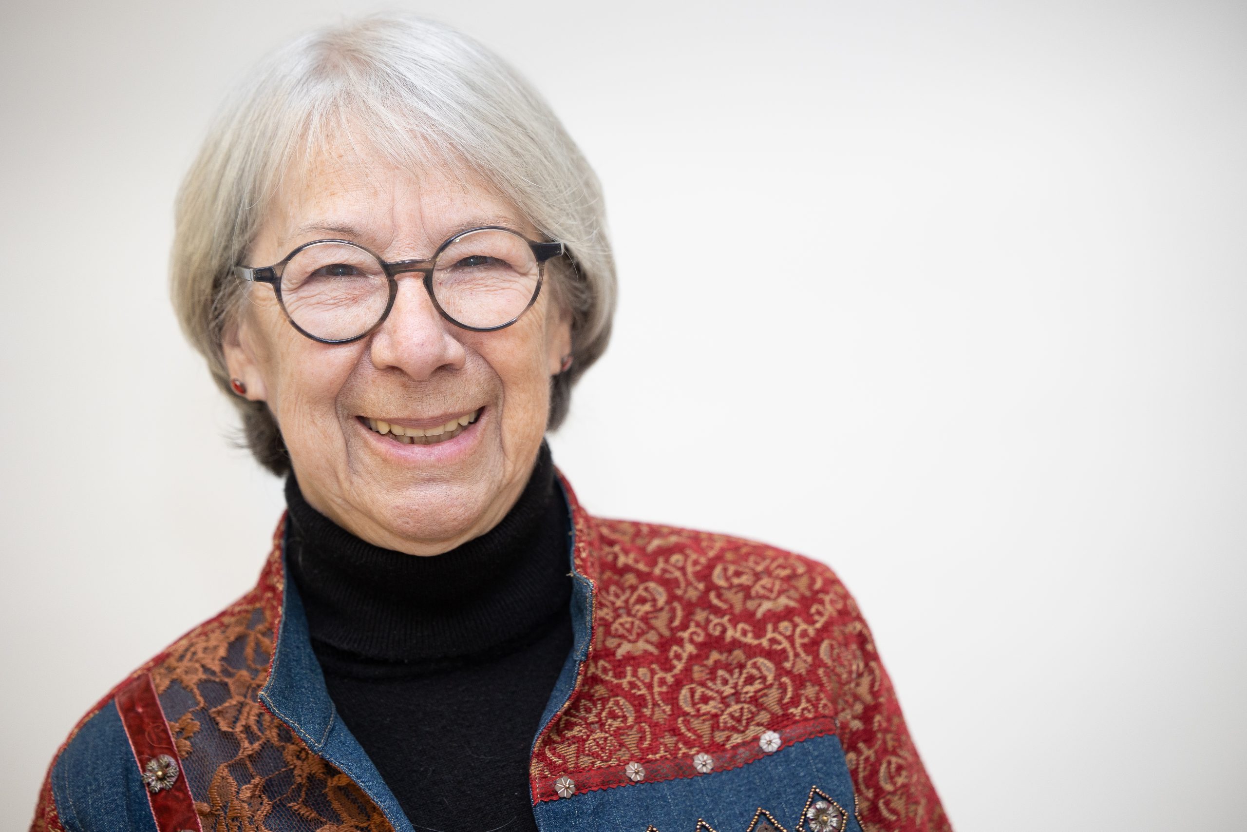 Colour photograph of Diane Vermette against a white backdrop.