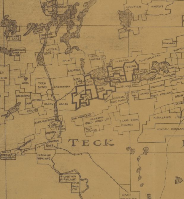 Numérisation couleur d’une carte dessinée à la main des mines en exploitation dans le canton de Teck durant les années 30. Les limites des propriétés minières sont irrégulières, et les mines semblent disposées au hasard, les unes à côté des autres, à la manière d’un patchwork.