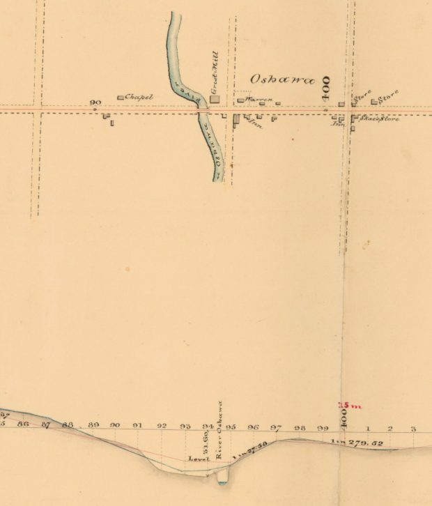 Une carte établie à la main représentant une petite ville, avec des routes, une rivière, et plusieurs petits bâtiments.