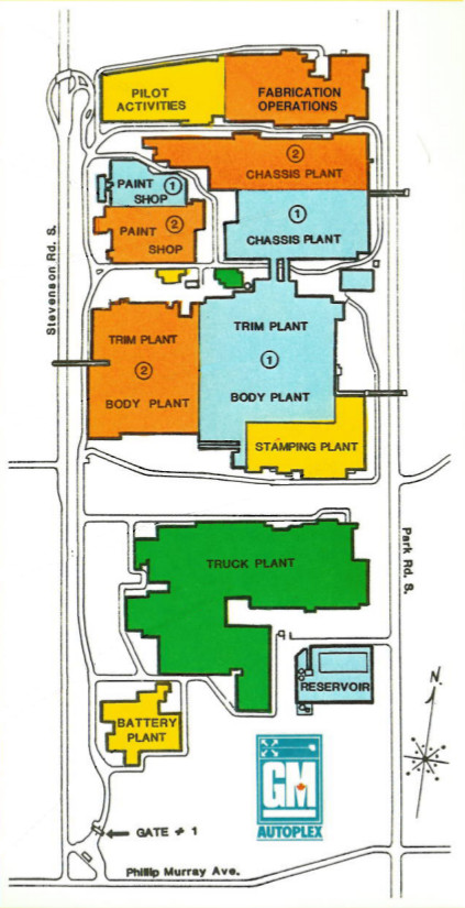 Une carte stylisée représentant une série de bâtiments d’usine vus d’en haut, avec les routes qui les relient. Une étiquette indique Autoplex GM.