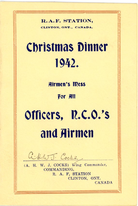 Page de couverture pour un menu du souper de Noël ; fond blanc-cassé, texte bleu, bordure rouge.