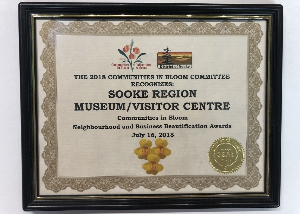 Certificat soulignant l’octroi d’un prix d’embellissement du quartier et des commerces au « Sooke Region Museum and Visitor Centre » (Musée et centre d’accueil de la région de Sooke) par le programme Collectivités en fleurs, 2018.
