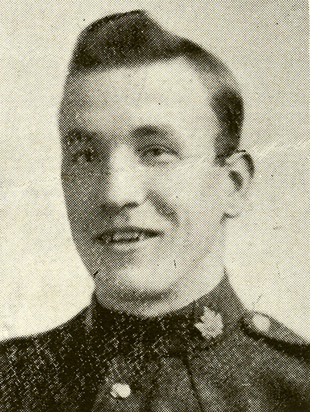 Portrait of a soldier smiling.