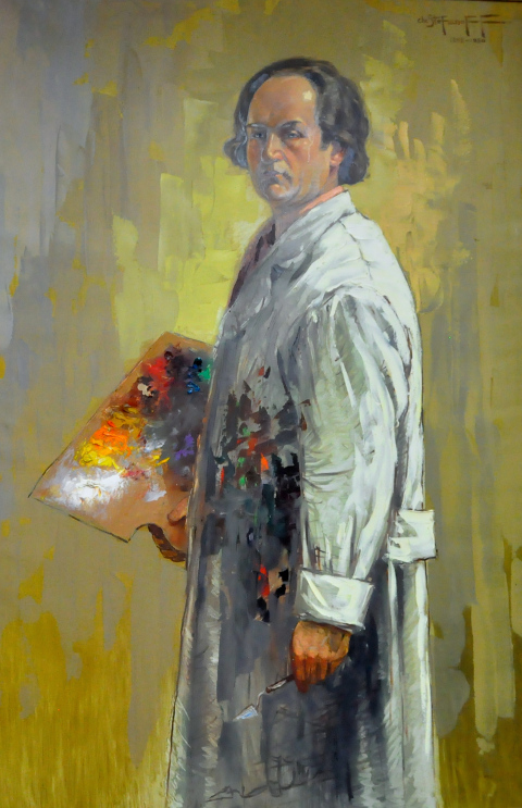 Autoportrait de l’artiste Christo Stepfanoff vêtu d’un tablier souillé de peinture, tenant d’une main sa palette de l’autre son pinceau.
